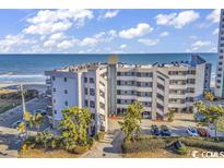 Oceanfront building with parking and landscaping at 1310 N Waccamaw Dr. # 201, Murrells Inlet, SC 29576