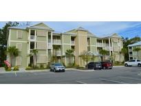 Modern building exterior with ample parking and landscaping at 35 Delray Dr. # 1-D, Murrells Inlet, SC 29576