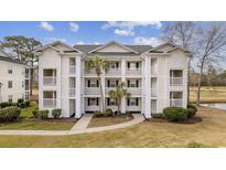 Three-story building exterior with balconies at 597 Blue River Ct. # 2A, Myrtle Beach, SC 29579