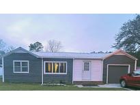 Charming one-story home with attached garage at 4343 N Fraser St., Georgetown, SC 29440