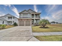 Two-story house with two-car garage at 202 Palmetto Harbour Dr., North Myrtle Beach, NC 29582