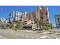 Sandcastle South Oceanfront resort building with parking and landscaping at 2207 S Ocean Blvd. # 1101, Myrtle Beach, SC 29577