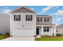 Two-story house with gray and white siding at 519 Harvest Ridge Way, Conway, SC 29527