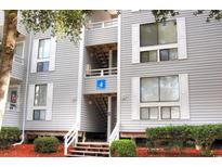 Exterior view of building with stairs and landscaping at 351 Lake Arrowhead Rd. # 4-315, Myrtle Beach, SC 29572