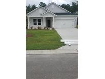 Single-story home with two-car garage at 574 Tullimore Ln., Calabash, NC 28467