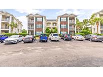 Brick building exterior with multiple levels and balconies at 472 River Oaks Dr. # 65C, Myrtle Beach, SC 29579