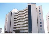 Modern high-rise condo building with balconies and ocean views at 517 S Ocean Blvd. # 705, North Myrtle Beach, SC 29582