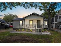 House exterior featuring a front porch and landscaping at 6001 - N-45 S Kings Hwy., Myrtle Beach, SC 29575