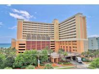 Oceanfront high-rise building with parking and landscaping at 6900 Ocean Blvd. N # 1205, Myrtle Beach, SC 29572