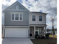 Two-story home with gray siding and stone accents at 126 Hancher Dr., Myrtle Beach, SC 29588