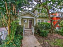 Charming two-story home with a welcoming front porch at 120 A Da Gullah Way # A, Pawleys Island, SC 29585