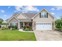 One-story house with brick accents and a large yard at 1225 White Fox Ct., Conway, SC 29526