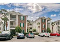 Brick building with green shutters and balconies at 500 River Oaks Dr. # 58I, Myrtle Beach, SC 29579