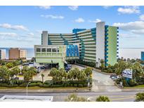 Oceanfront hotel with parking and palm trees at 1105 S Ocean Blvd. # 228, Myrtle Beach, SC 29577