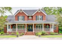 Brick house with large front porch at 5414 Hampton Rd., Conway, SC 29527