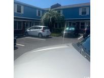 Parking lot in front of blue building at 509 67Th Ave. N # F, Myrtle Beach, SC 29572
