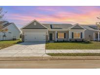 Two-story home with brick and siding at 3327 Little Bay Dr., Conway, SC 29526