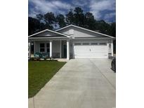 New construction home with two-car garage and stone accents at 563 Beckham Ct., Murrells Inlet, SC 29576