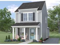 Two-story home with gray siding and light blue door at 9024 Mabel Ct., Longs, SC 29568