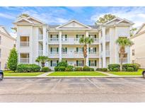 Attractive three-story building with ample parking at 624 River Oaks Dr. # 52G, Myrtle Beach, SC 29579
