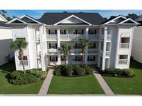 Attractive three-story condo building with palm trees and landscaping at 616 River Oaks Dr. # 54F, Myrtle Beach, SC 29579