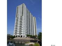 High-rise building with water views and landscaped grounds at 5905 South Kings Hwy. # 811, Myrtle Beach, SC 29577