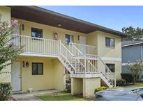 Two-story building with stairs and balconies at 1301 Pridgen Rd. # 1008, Myrtle Beach, SC 29577