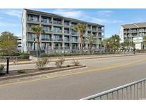Exterior view of a building, possibly a condo building with ocean views at 2000 Ocean Blvd. S # 306, Myrtle Beach, SC 29577