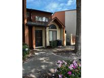Front view of townhome with walkway and landscaping at 610 14Th Ave. S # 181, Surfside Beach, SC 29575