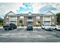 Brick building exterior with parking at 2013 Silvercrest Dr. # 30-H, Myrtle Beach, SC 29579