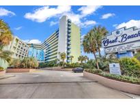 Coral Beach Resort entrance with lush landscaping at 1105 Ocean Blvd. S # 412, Myrtle Beach, SC 29577