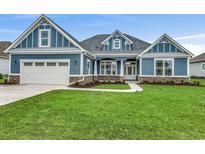 Two-story home with blue siding and stone accents at 1104 Maccoa Dr., Conway, SC 29526