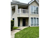 Inviting condo exterior with a well-maintained lawn and balcony at 200 Landing Rd. # 111, North Myrtle Beach, SC 29582