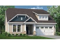 Attractive Craftsman style home with two-car garage, stone accents, and landscaping at 880 Mountain Mint Circle Nw, Calabash, NC 28467