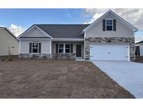 Two-story house with stone accents and a two-car garage at 428 Hallie Martin Rd., Conway, SC 29527