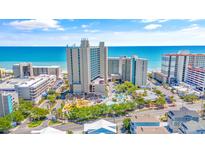 Aerial view of oceanfront resort with pools and beach access at 202 74Th Ave. N # 1249/50, Myrtle Beach, SC 29572