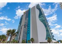 Oceanfront high-rise building with modern design and balconies at 107 S Ocean Blvd. # 1908, Myrtle Beach, SC 29577
