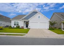 Two-story craftsman style home with two car garage at 2013 Great Blue Heron Dr., Little River, SC 29566