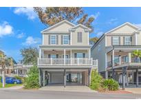 Two-story home with elevated carport and balcony at 6001-Mh 32A S Kings Hwy., Myrtle Beach, SC 29575