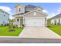 Two-story home with a two-car garage at 2321 Copper Creek Loop, Longs, SC 29568