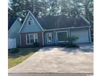 A charming two-story home with a two-car garage at 9570 Maison Ct., Myrtle Beach, SC 29572