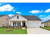 Charming one-story home with a white exterior, dark gray roof, and landscaping at 5047 Selene Ct., Myrtle Beach, SC 29588