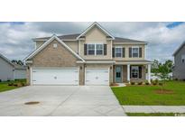 Two-story home with brick and siding exterior, two-car garage at 2001 Summersail Ct., Myrtle Beach, SC 29579