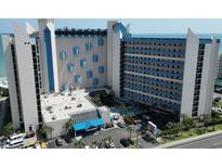 Ocean Reef Resort aerial view showing building, pool, and parking at 7100 Ocean Blvd. N # 919, Myrtle Beach, SC 29572