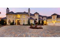 Elegant home with a fountain and circular driveway at 2715 Ships Wheel Dr., North Myrtle Beach, SC 29582