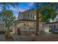 Two-story home with front porch and walkway at 6001-7038 S Kings Hwy., Myrtle Beach, SC 29575