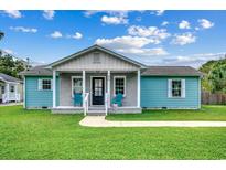 Charming light blue house with gray brick accents at 829 44Th Ave. N, Myrtle Beach, SC 29577