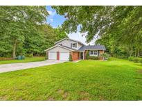 Two-story home with a brick facade and double garage at 1720 Horry St., Conway, SC 29527