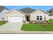 One-story house with neutral siding, stone accents, and a two-car garage at 650 Blackthorne Circle Nw, Calabash, NC 28467