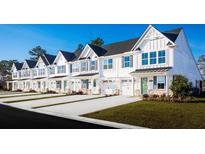 Row of townhouses with white siding and gray accents at 2349 Elowen Ln. # 11A, Longs, SC 29568